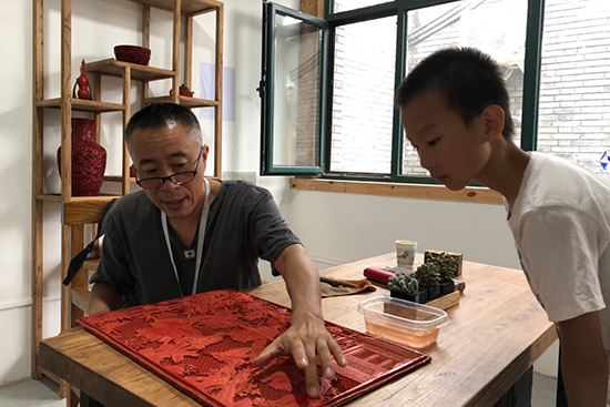 "胡同文化节"设有非遗精品廊,会客厅,大师工作室,互动社区,非遗书院等